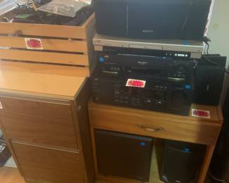 Stereo equipment, wires, side table, filing cabinet