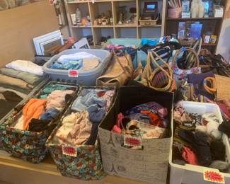 We had so much clothing we spilled onto the bed!
Clothing, decor, purses