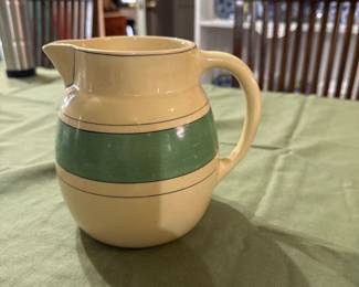 EARLY 1915 To 1920'S ROSEVILLE POTTERY CREAMWARE GREEN & BLACK STRIPE PITCHER . Pristine condition.
$145 obo