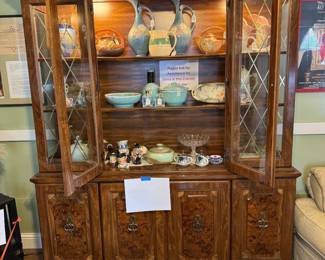 China cabinet for sale.
Items for sale in cabinet include several Roseville, Hull, Fenton, and other collectibles in pristine condition.