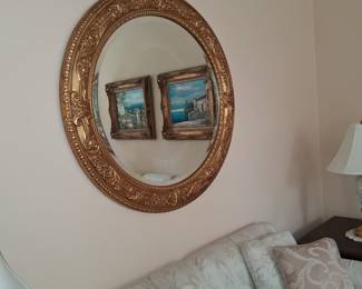 gilt round wall mirror