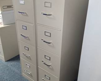 4 drawer like new filing cabinets,
