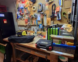 wooden tool bench and tools in basement