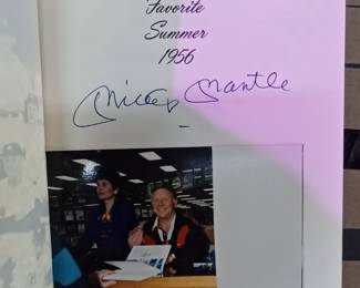 mickey mantle sign book with photo of micky holding book