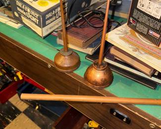 two vintage oil cans