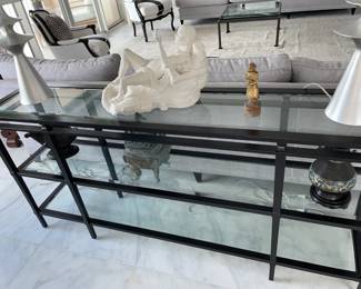 $600. Metal three tier console table 58” long, 14” deep, 32”” tall