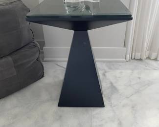 $250. Square black modern table with glass topper. 24” tall. 18” square