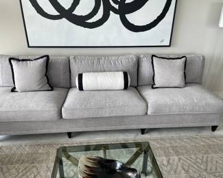 $2,000 EACH. TWO (2) 9’ Hickory Chair, soft grey, armless three cushion sofas, woven linen, excellent condition. 18.5” floor to seat, 29” deep. $400. Bronze/metal square coffee table, 1” glass top. 30”x30”