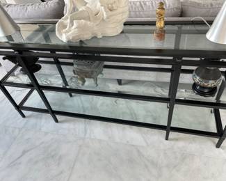 $600. Metal three tier console table 58” long, 14” deep, 32”” tall