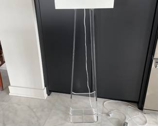 $600 EACH. Two (2) Pablo Pardo lucite lamps 60” tall, 18” across shade. Tapered from bottom to top.