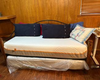 Trundle bed – 2 twin beds, makes king when lower bed pulled out. With bed shirt and pillows makes cute sofa/day bed
