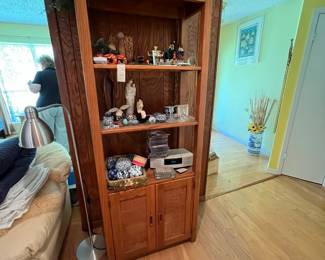 Part of 3-piece bookshelf unit: bookshelf with glass shelves. There are 2 shelves and 1 cabinet unit