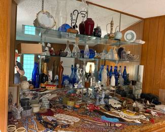 Variety of glass items and jewelry