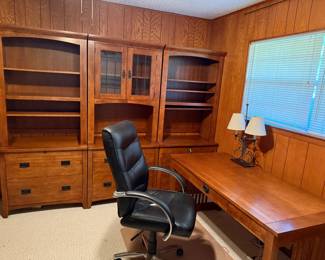 Home office set: 2 open bookshelves with lower (file) drawers, 1 bookshelf upper shelves with glass doors, and matching desk. Black office chair