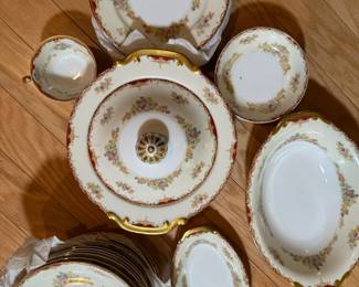 Fine China. Set for 12 with plates, bread plates, bowls, etc. and many serving dishes