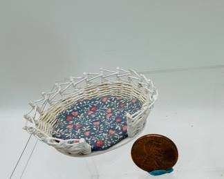 Miniature wicker cat bed