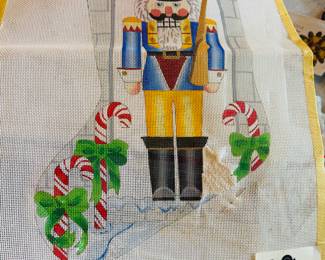 Mrs Angell also enjoyed needlepoint and Crosstitch. There are several handpainted canvases like the one above.