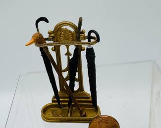 Miniature umbrella stand with umbrellas and canes
