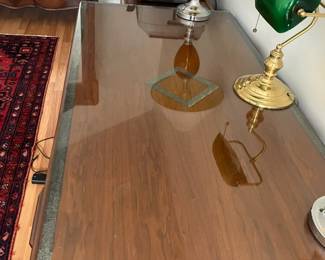 Antique glasstop desk with lamps