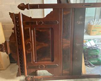 Headboard of antique bed. Will be set up for the sale.
