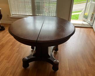 Antique dining table side view