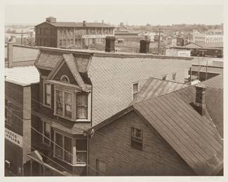 39
George Tice
b. 1938
"Rooftops, 21st. Ave. & King St., Paterson, N.J.," from the "Paterson" portfolio, 1969
Platinum print on paper mounted to thin matboard, as issued
Signed in pencil in the lower right of the matboard: Geo. A. Tice; titled in pencil on the verso of the matboard, along the upper edge
Image/Sheet: 7.625" H x 9.625" W; Matboard: 14" H x 17" W
Estimate: $1,000 - $1,500