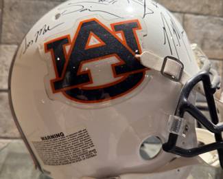 Auburn football helmet signed by multiple players