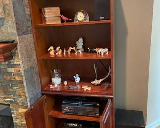 Quality Bookcase with double door cabinet,with figurines, electronic receivers, wolfer and more!