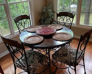 Beautiful Scrolled Iron Kitchen Dinette Set with matching Barstools. Barstools can be sold separately.