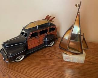 Collectible model "Woody" complete with surfboard atop car, and Brass Sailboat and marble base