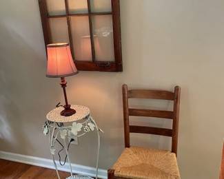 Antique Rush Seated Slat back Chair, 6 paned hanging window, Ornate Iron Fern Stand, and Table Lamp