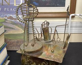 Tin golf music box