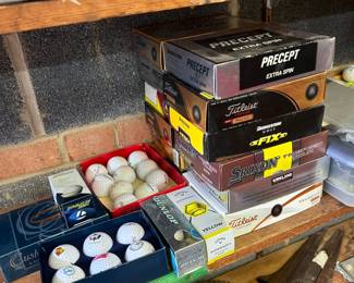 Precept, Titleist, Srixon, and Dunlop golf balls