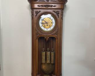 Carved wood pendulum wall clock