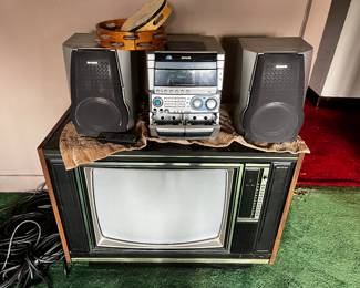 AIWA CD RW NAJ70,
Vintage tube TV Philco Ford Pop Color TV, a vintage television set from the late 1960s to early 1970s.
