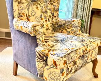 $300; custom upholstered wingback chair by Burlington with avian and botanical details; 32x28x44; side view to see two fabrics