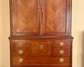 $1200; Lexington Palmer Home 2-piece entertainment cabinet with inlaid wood and brass hardware and lion's head pull; 46x23x86