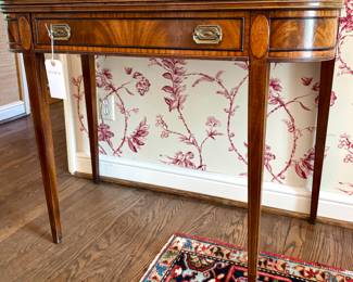 $450; Berkey & Gay one-drawer curved desk with veneer, brass hardware; 38x19x30