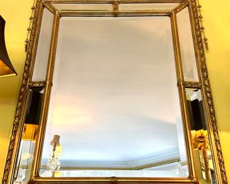 SOLD; French gilt wood beveled glass mirror with urn and vine detail; 32x51