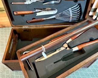 $200; wood and wicker gardening box with lift out tray including all of the wood-handled and stainless steel gardening tools