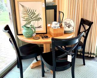 ($150; butcher block round pedestal table) ($80 each-4 available; Crate and Barrel x-back chair)