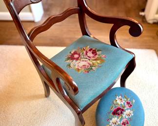 ($150; vintage mahogany needlepoint chair with scrolled arm and floral back; 21x22x35) ($60; needlepoint foot rest; 16x12x6)