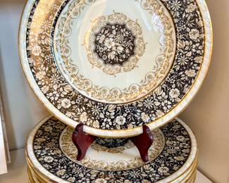 $180; set of 12 Charles Ahrenfeldt Limoges black and gold dinner plates; 11"d