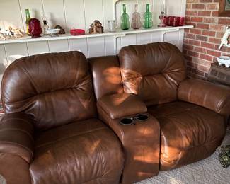 Not only do the seats in this super-comfy loveseat recline…they also rock! 