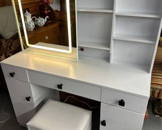 Lighted makeup table with bench. If you are needing a gift for a wife, daughter, or granddaughter, they will be absolutely delighted with this touch multi-light dressing table (several light setting to choose from)