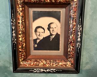 Couple portrait in elaborate Victorian shadow box frame