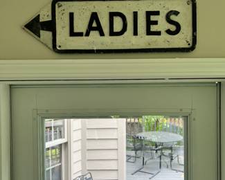 Vintage cast iron sign