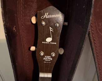 #49 Harmony Banjo with case $125.00