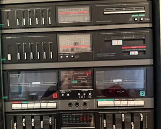#52 MCS Series stereo system with cabinet and speakers $300.00