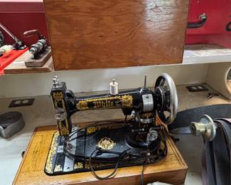 * #103 White sewing machine with lid serial #1781654 $60.00